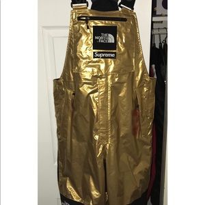 The north face x supreme gold metallic bib pants